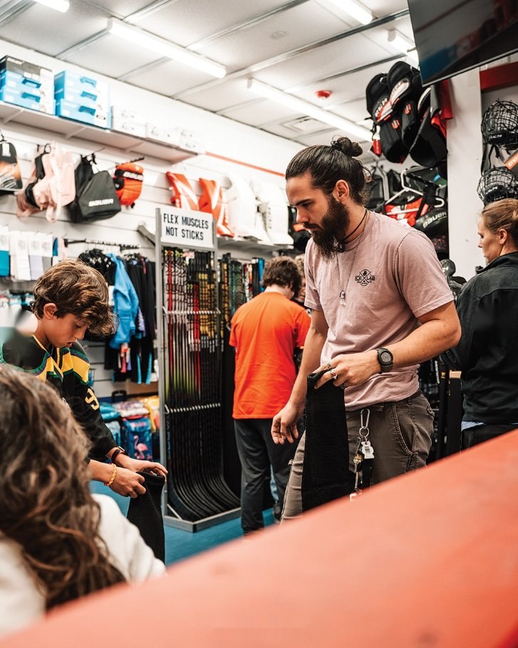 Helping a customer find the right fit at Ice Lab